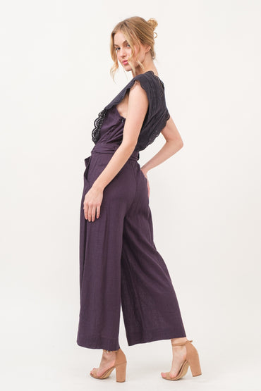 Elegant lace detail surplice jumpsuit with tie waist