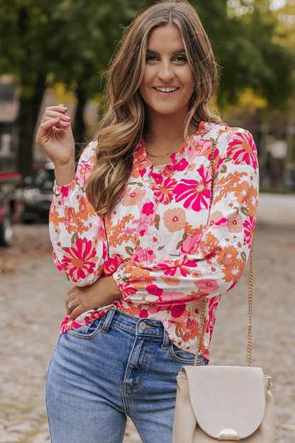 Floral V-Neck Frill Long Sleeve BlouseFloral V-Neck Frill Long Sleeve Blouse
 Indulge in elegance with our Floral V-Neck Frill Long Sleeve Blouse, a versatile piece that seamlessly combines sophisticatioLove Salve -Neck Frill Long Sleeve BlouseBlouses