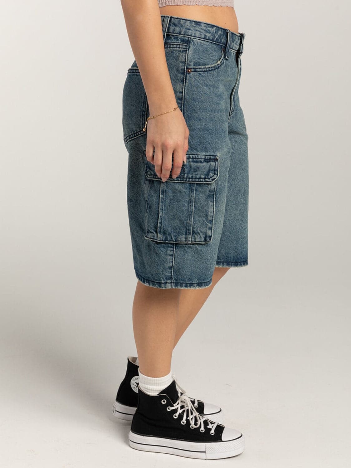 Casual chic mid-rise denim shorts with functional pockets