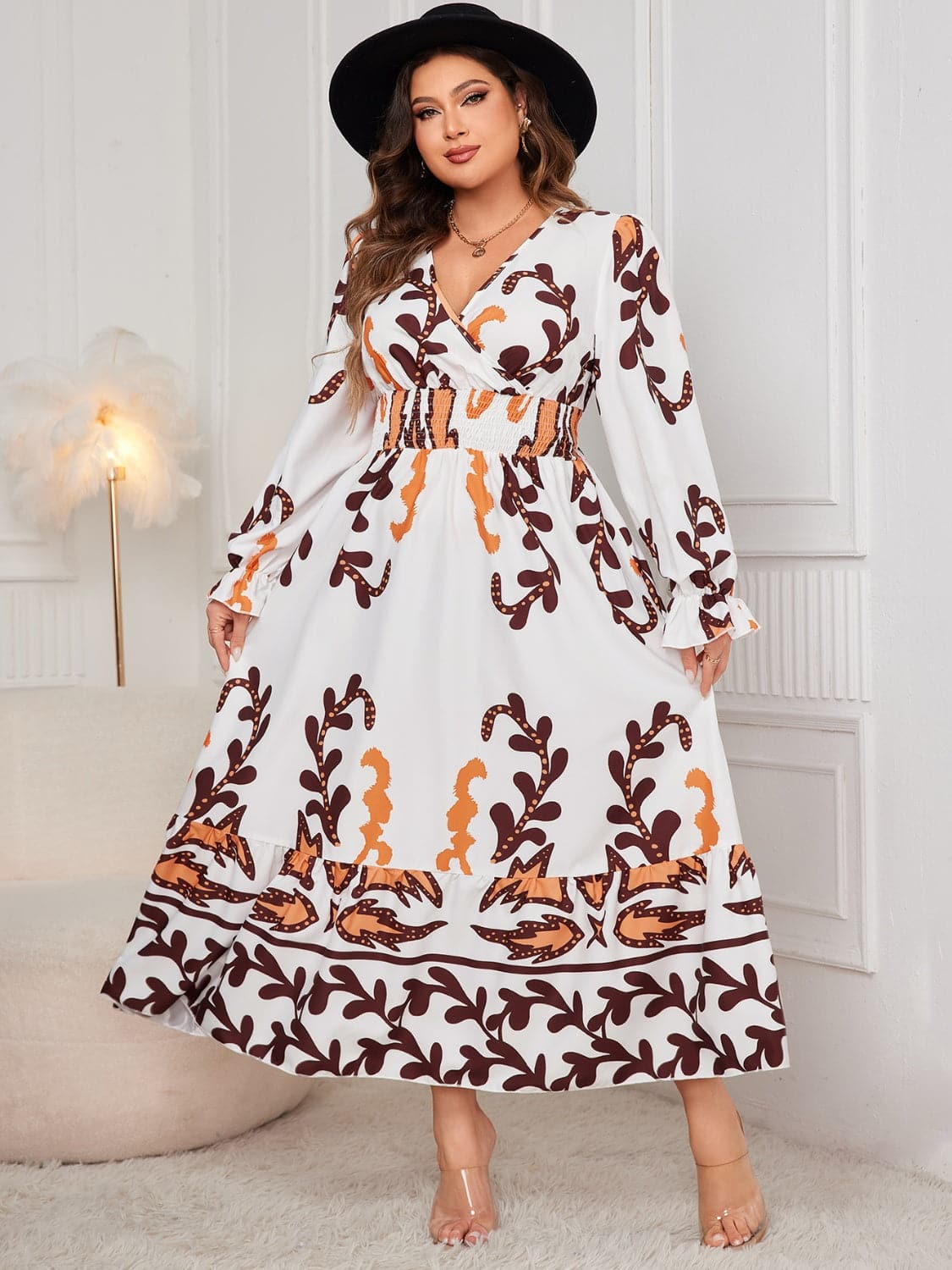 Plus Size Printed Surplice Flounce Sleeve Dress.