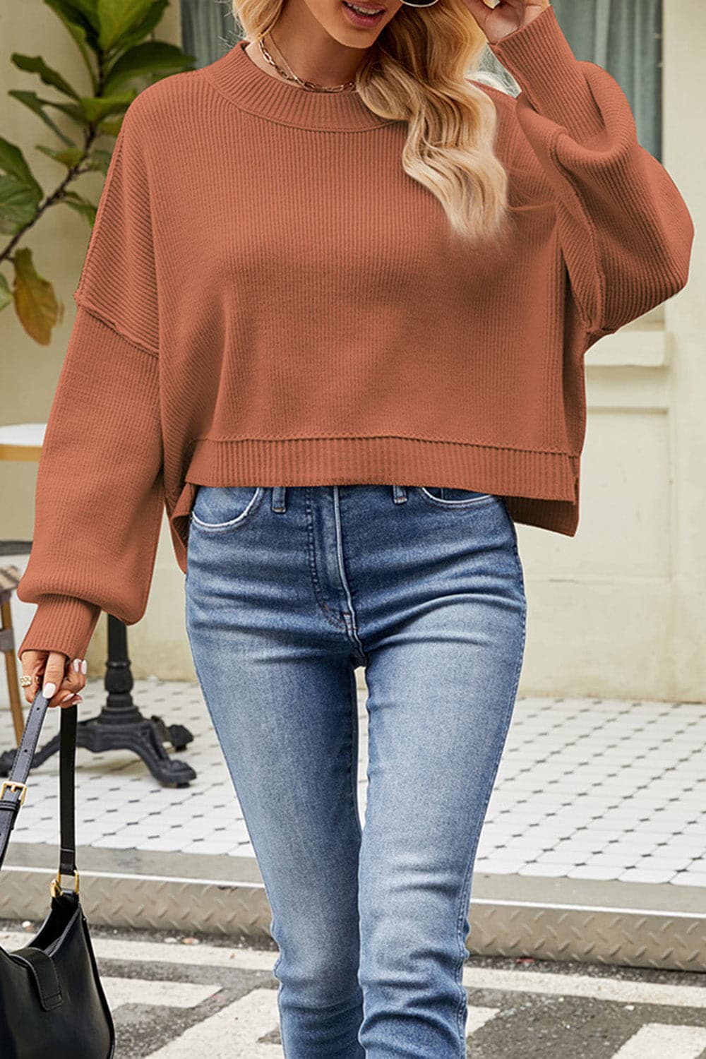 Round Neck Dropped Shoulder Sweater.