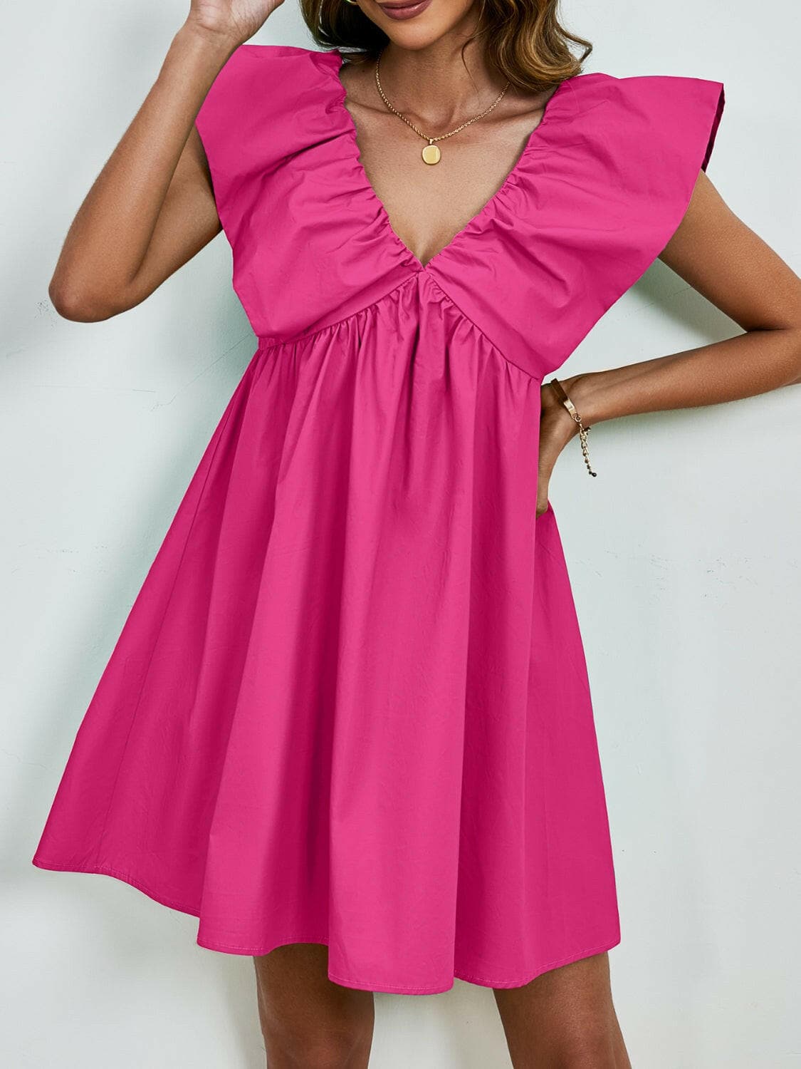 V-Neck Cap Sleeve Mini DressUpgrade Your Style with Our V-Neck Cap Sleeve Mini Dress
 Step out in confidence and elegance with our V-Neck Cap Sleeve Mini Dress, a versatile piece that effortlesLove Salve -Neck Cap Sleeve Mini Dress