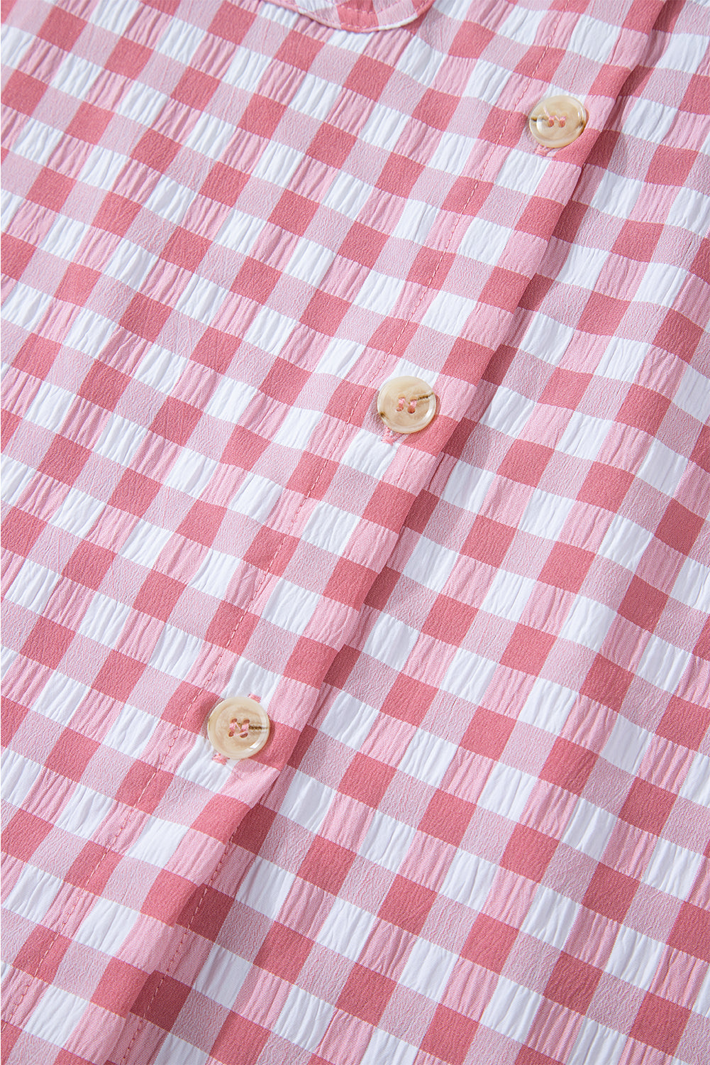 Chic pink gingham collared shirt with functional chest pockets