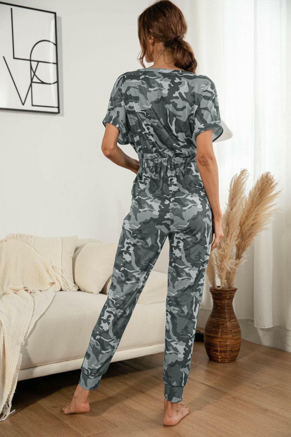 Surplice Neck Tied Short Sleeve Jumpsuit.