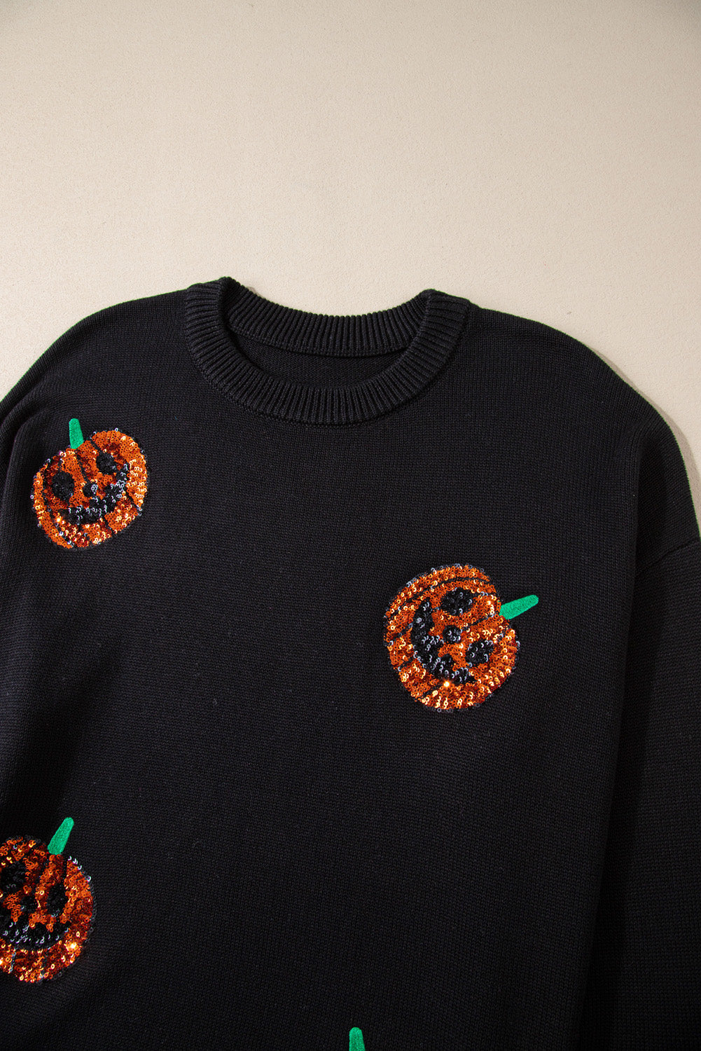 Chic black plus size sequined pumpkin sweater for Halloween celebrations