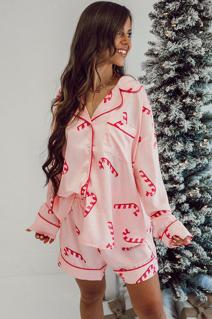 Pink candy cane print holiday pajama set with shirt and shorts