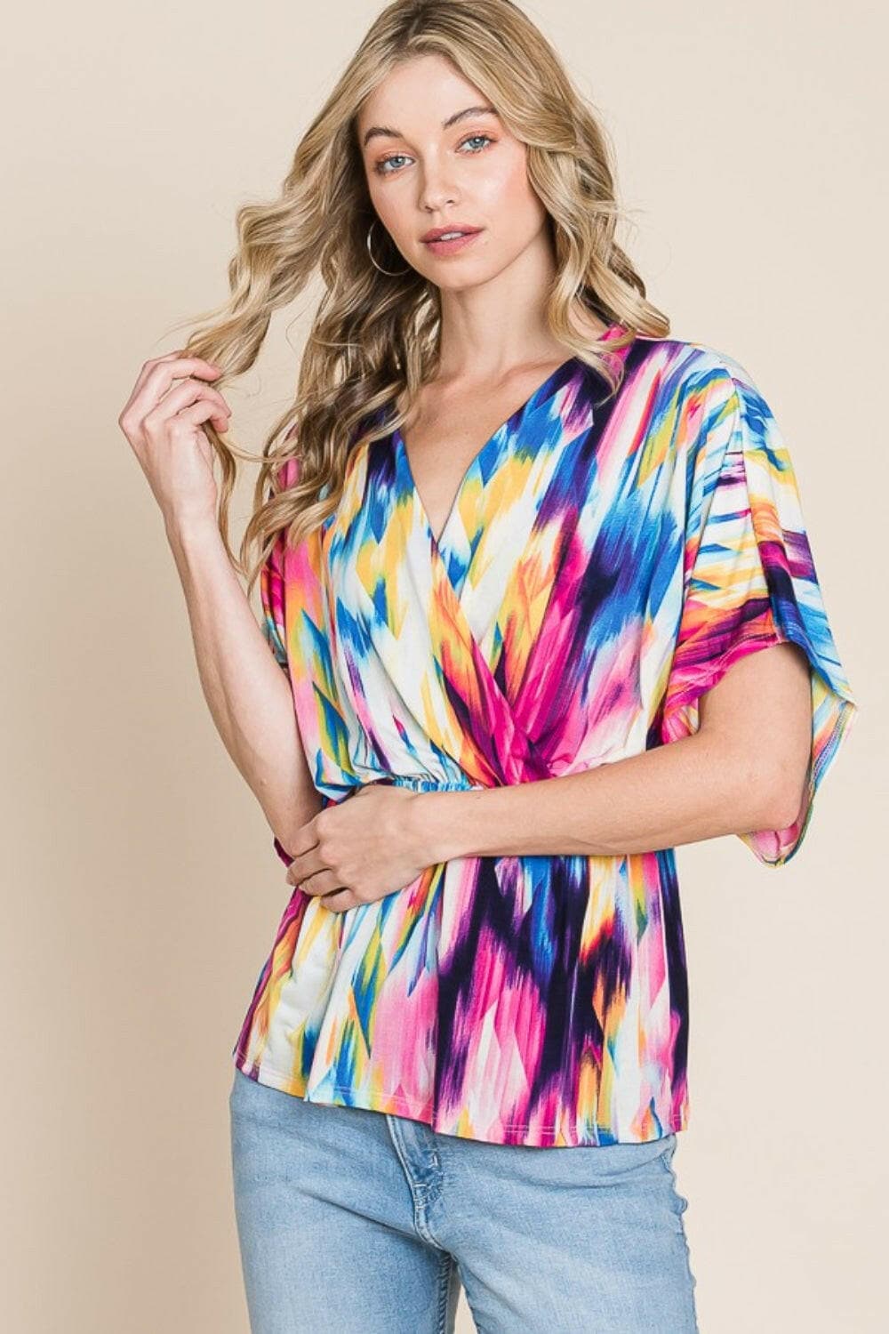 BOMBOM Printed Surplice Peplum Blouse.