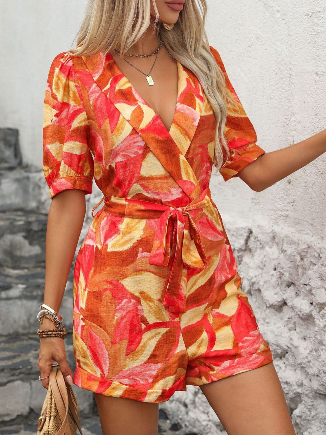 Printed Surplice Half Sleeve Romper.