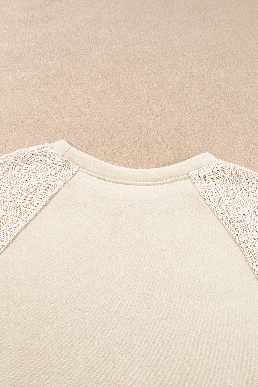 Chic parchment eyelet knit patchwork pullover with raglan sleeves