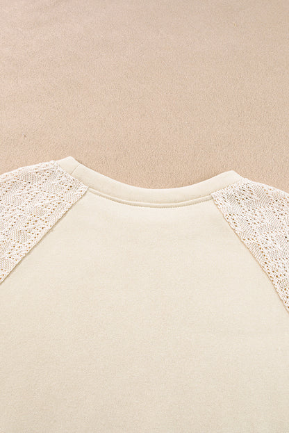 Chic parchment eyelet knit patchwork pullover with raglan sleeves