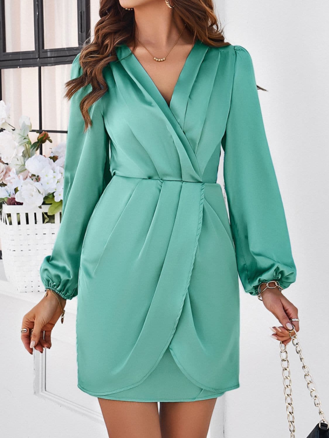 Ruched Surplice Long Sleeve Mini Dress.