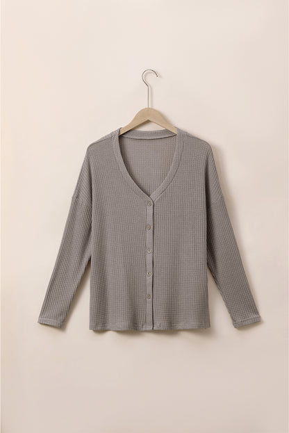 Cozy taupe waffle knit plus size V-neck top with button details