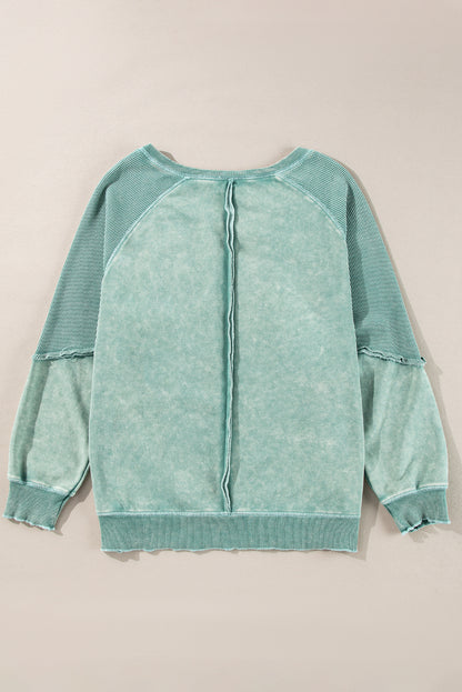 Cozy mineral blue waffle knit sweatshirt with patchwork raglan sleeves