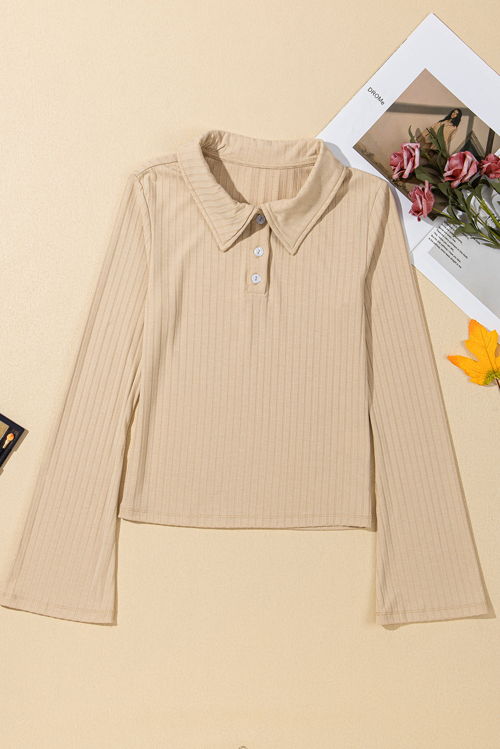 Chic beige ribbed long sleeve top with buttoned collar