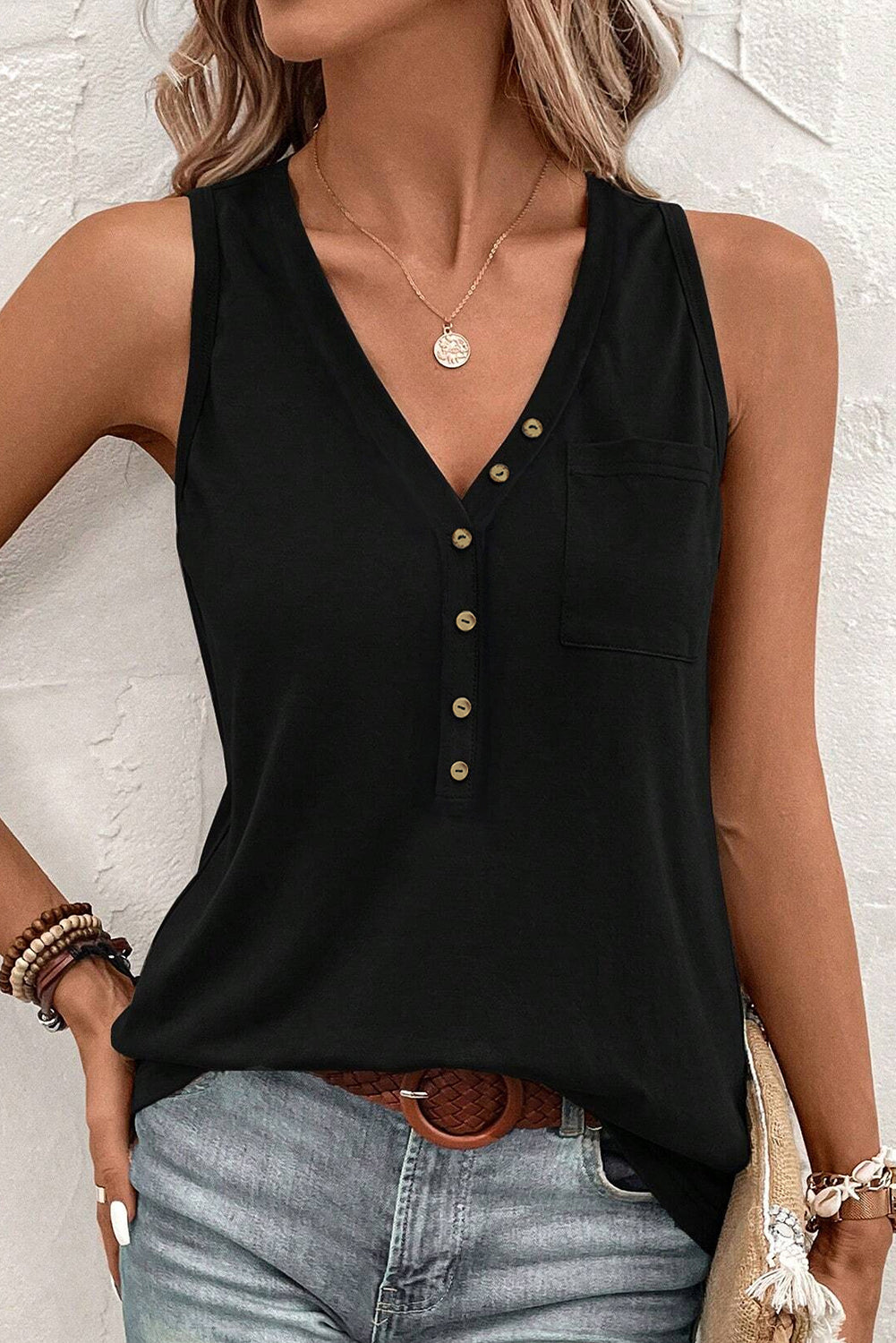 Chic black v-neck tank top with half buttons and patched pocket