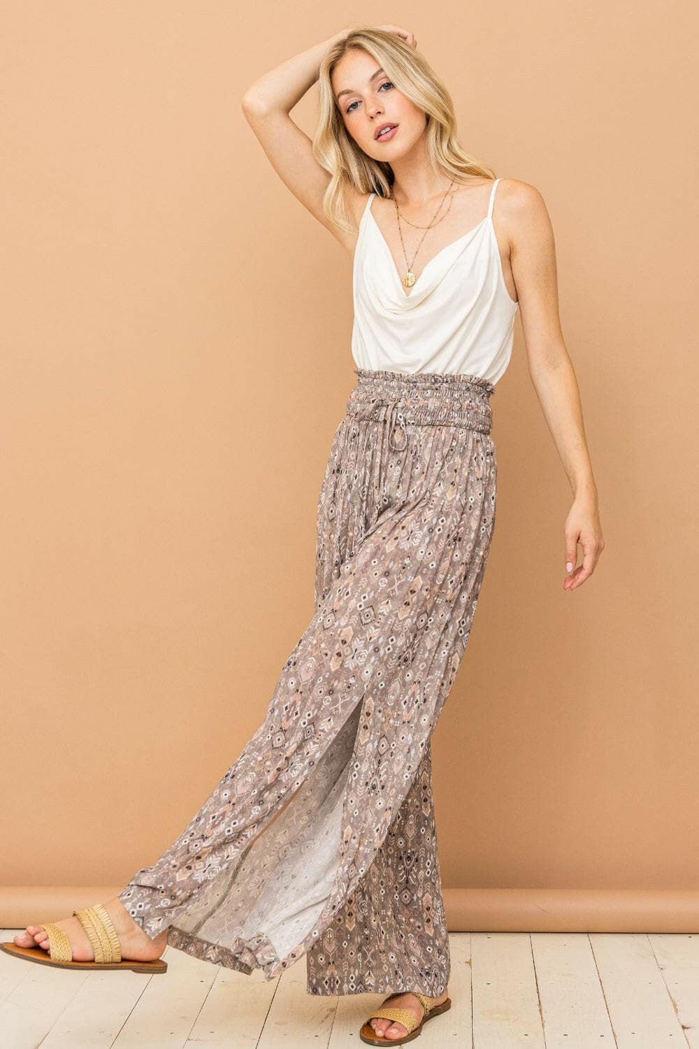 And The Why Printed Smocked Waist Slit Wide Leg PantsUpgrade Your Wardrobe with Style and Comfort
 The And The Why Printed Smocked Waist Slit Wide Leg Pants are a must-have addition to your fashion collection. These paLove Salve Printed Smocked Waist Slit Wide Leg Pantsusa