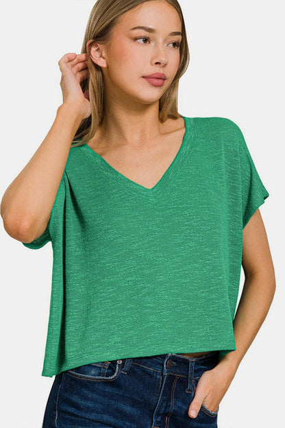 Zenana V-Neck Short Sleeve T-ShirtUpgrade Your Wardrobe with the Zenana V-Neck Short Sleeve T-Shirt
 The Zenana V-Neck Short Sleeve T-Shirt is not just an ordinary tee; it is a must-have fashion piecLove Salve -Neck Short Sleeveusa