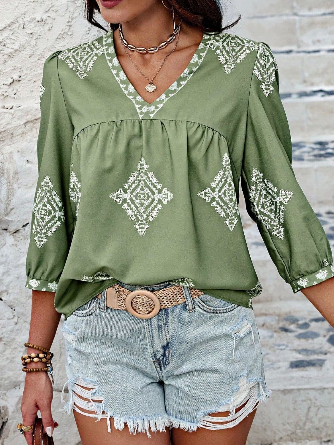 Printed V-Neck Three-Quarter Sleeve Blouse.