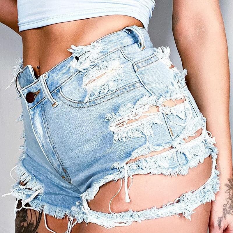 Asymmetrical Distressed Denim Shorts.