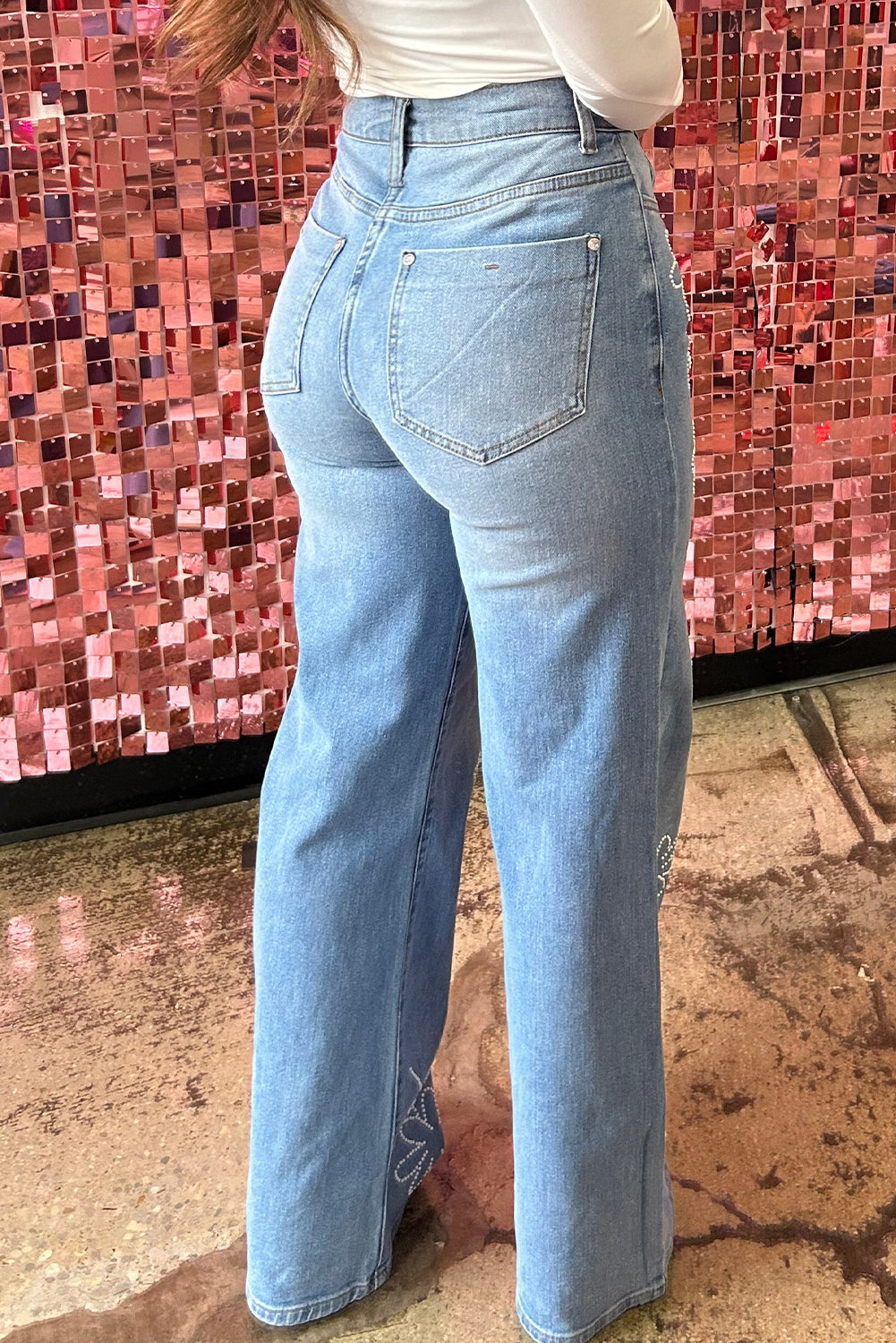 Light blue wide leg jeans with rhinestones