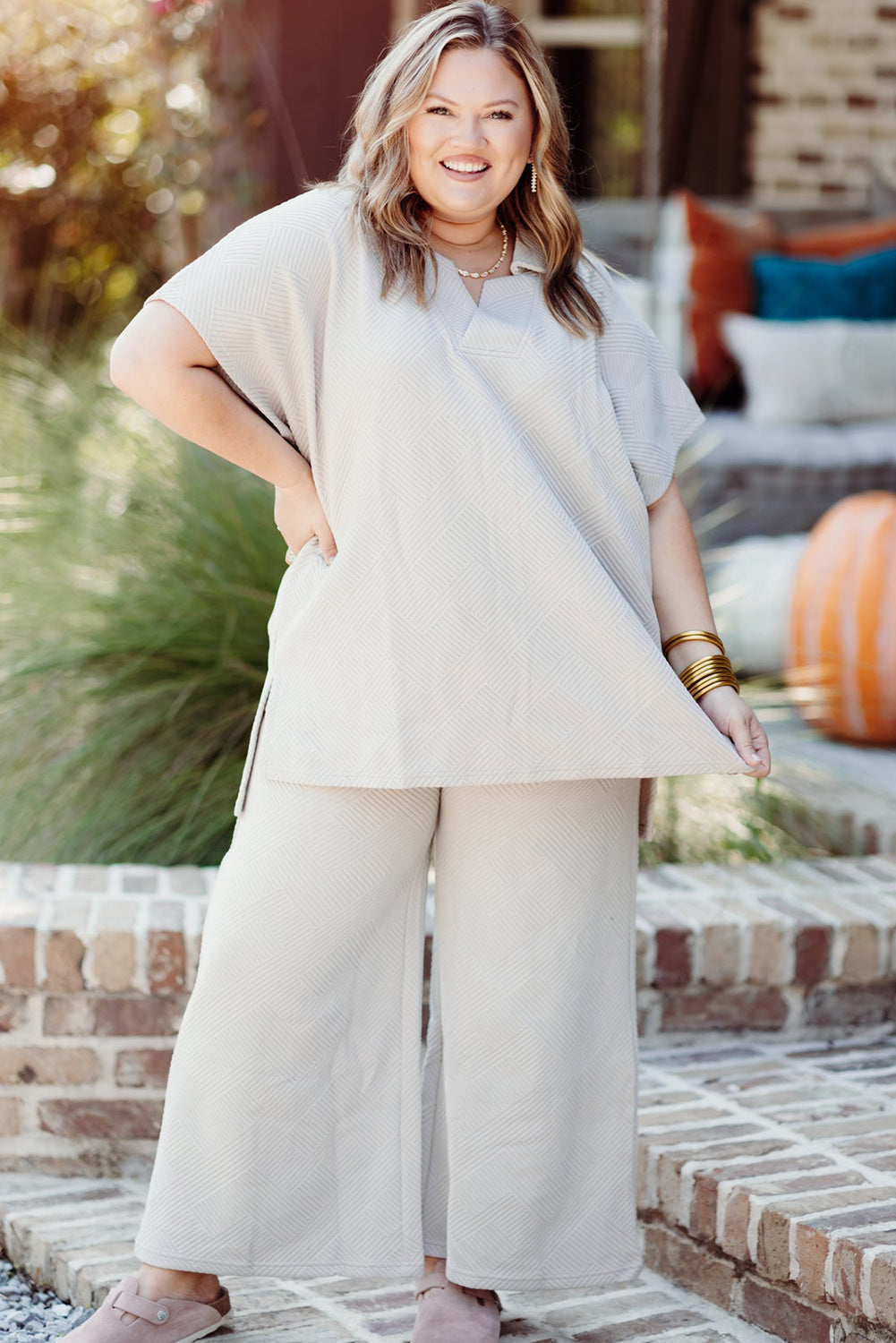 Chic beige plus size textured top and pants ensemble