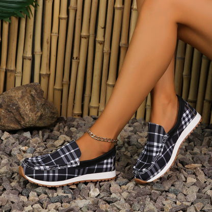 Plaid Round Toe Slip-OnsIncludes: Box not included
Heel height: Flats
Material: Elastomer, Polyester
Imported


Size
Foot length


35(US4)
8.8


36(US5)
9


37(US6)
9.2


38(US7)
9.4


39(ULove Salve Plaid Round Toe Slip-OnsShoes