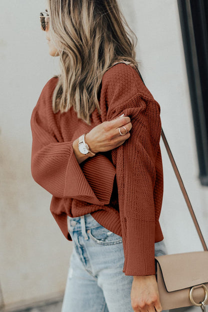 Chic textured long sleeve sweater with stylish slit detail