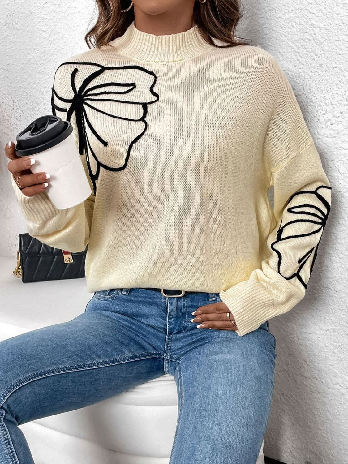 Cozy mock neck sweater with dropped shoulders and long sleeves