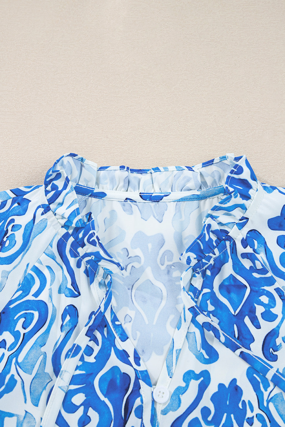 Premium Sky Blue Ethnic Printed Tie Neck Button Puff Sleeve Shirt