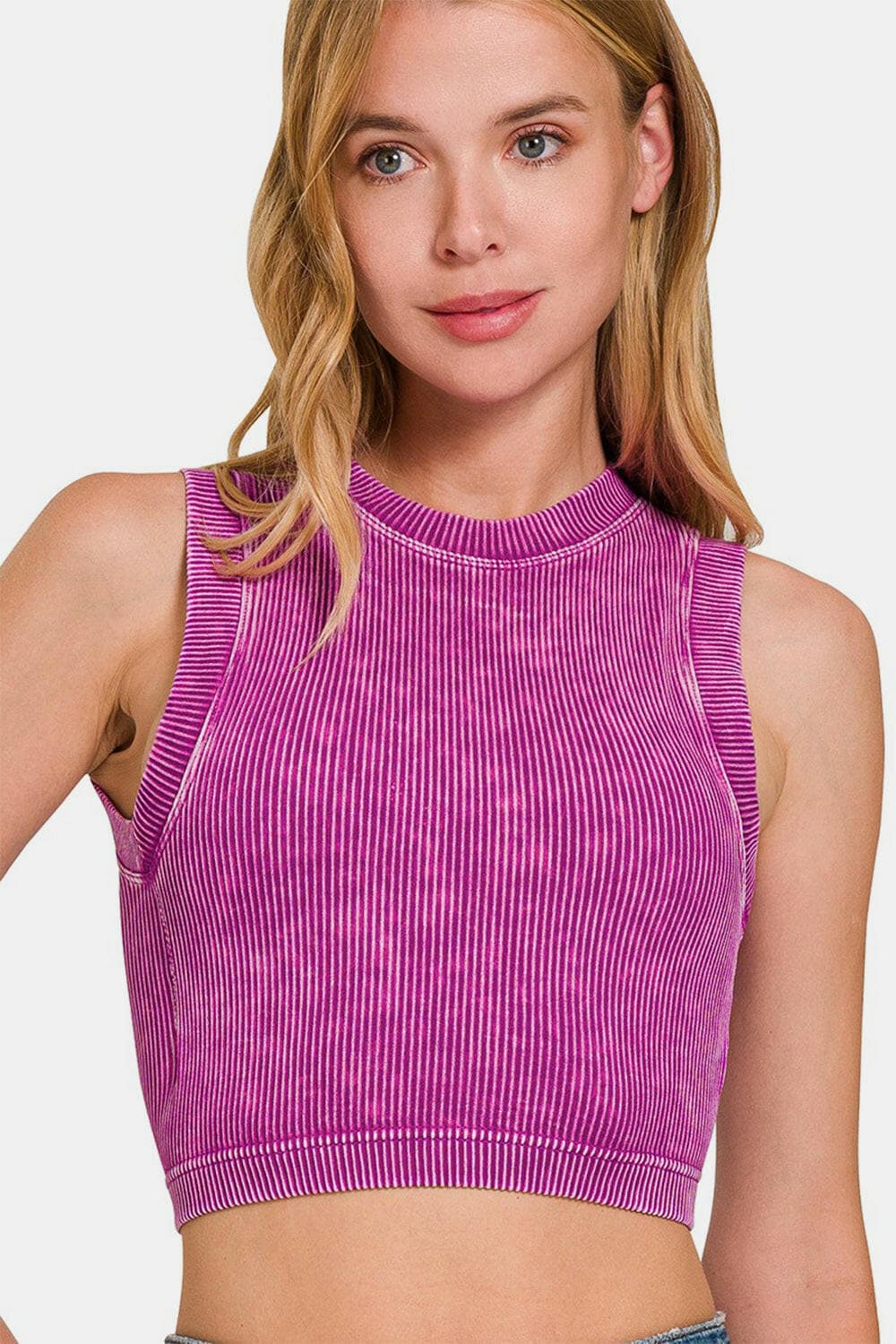 Zenana Washed Ribbed Seamless Crop Tank with Bra Pad in pink worn by a model.