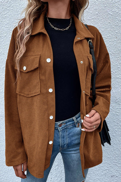 Chic brown textured shacket with flap pockets and drop shoulder design