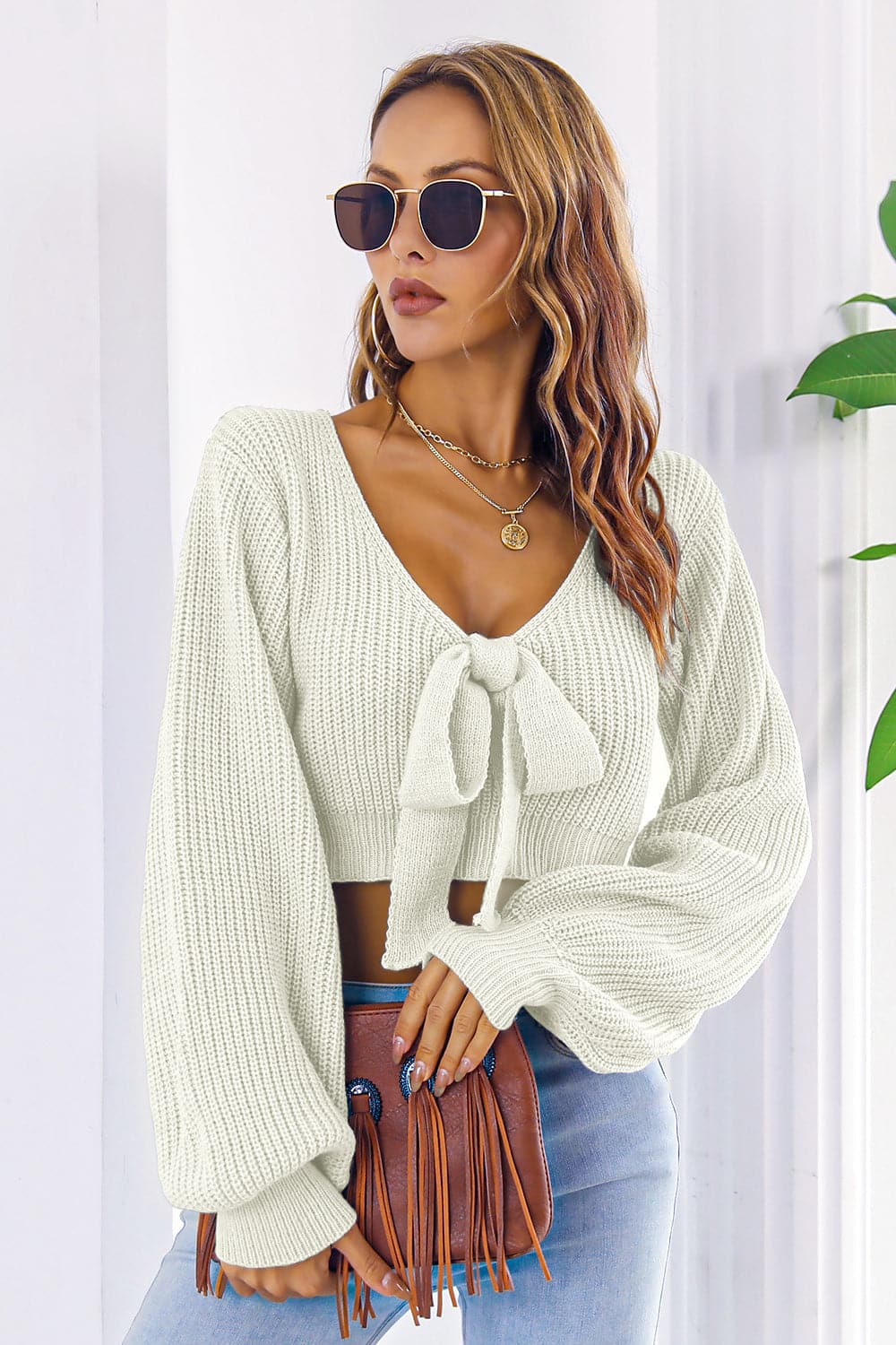 Bow V-Neck Long Sleeve Cropped Sweater.