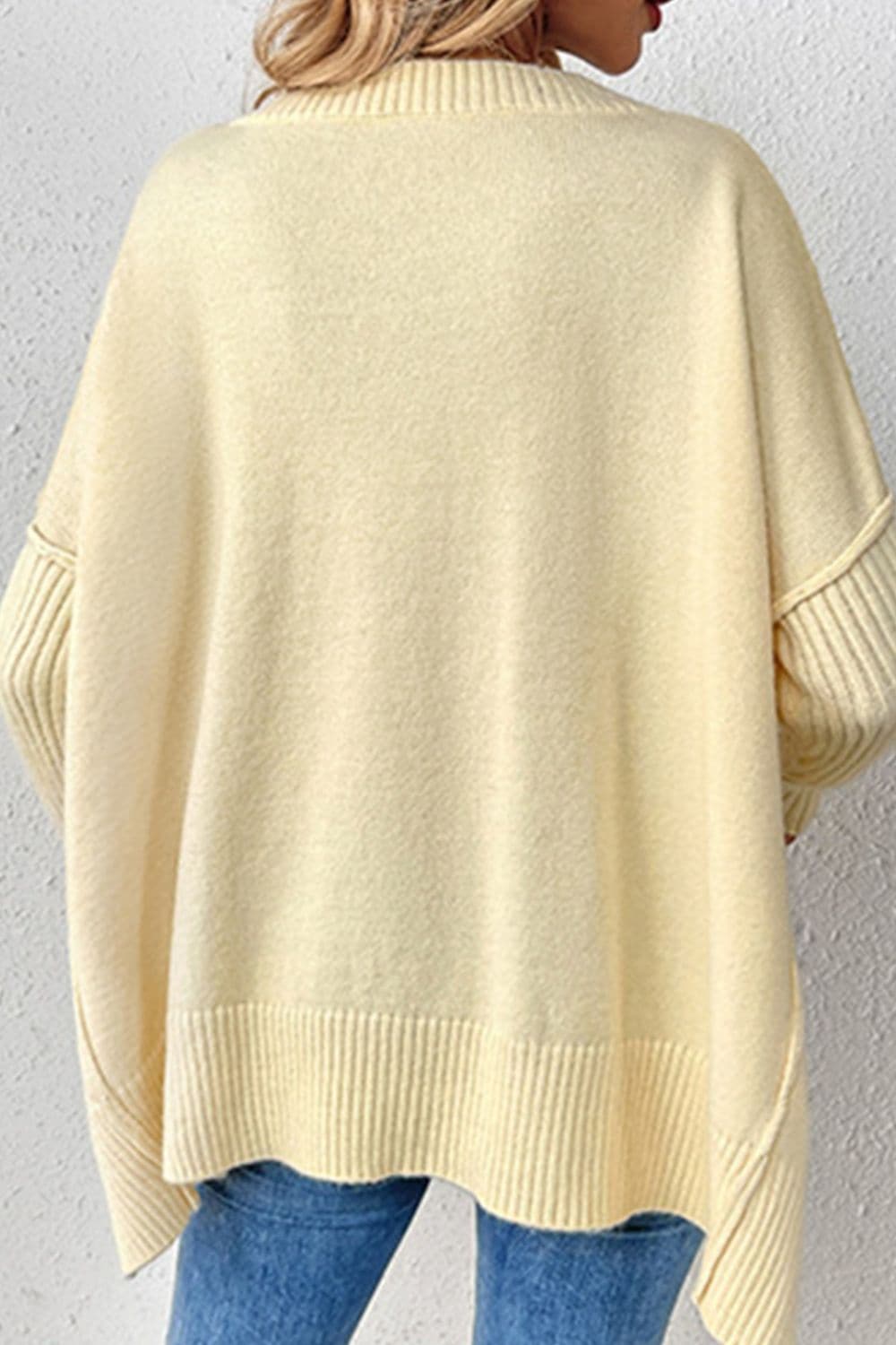 Slit V-Neck Dropped Shoulder Sweater.