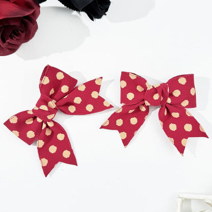 Charming 2-piece polka dot hair bow clips