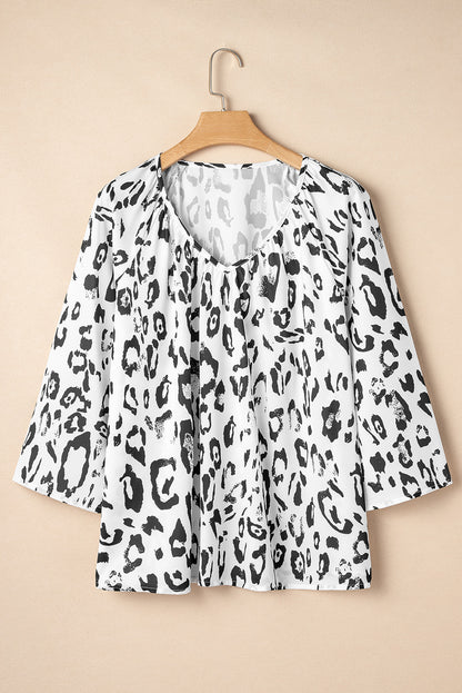 Fierce and Flirty Black Leopard Print Blouse with Ruched V-Neck