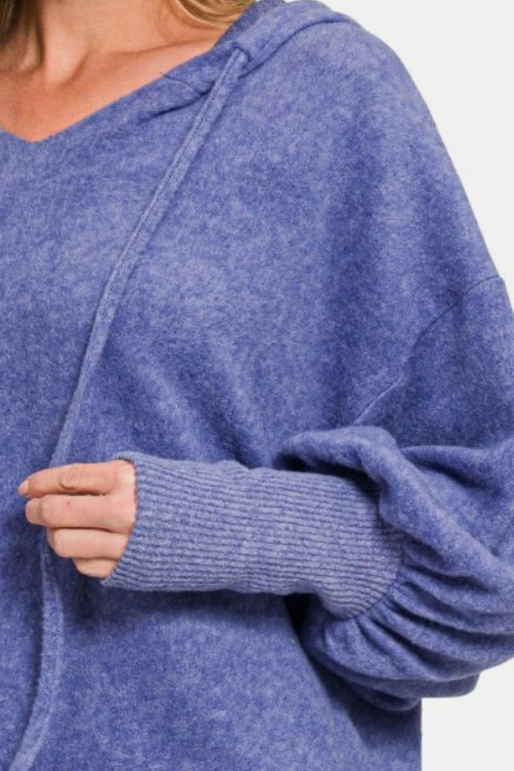 Zenana brushed hacci drop shoulder cropped hoodie in blue fabric close-up.