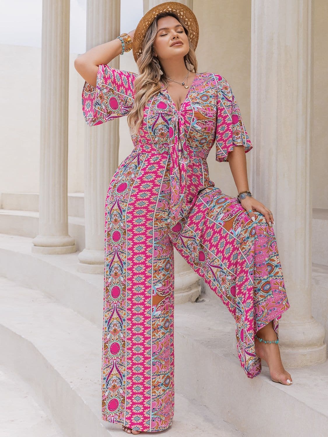 Plus Size Printed Half Sleeve Wide Leg Jumpsuit.