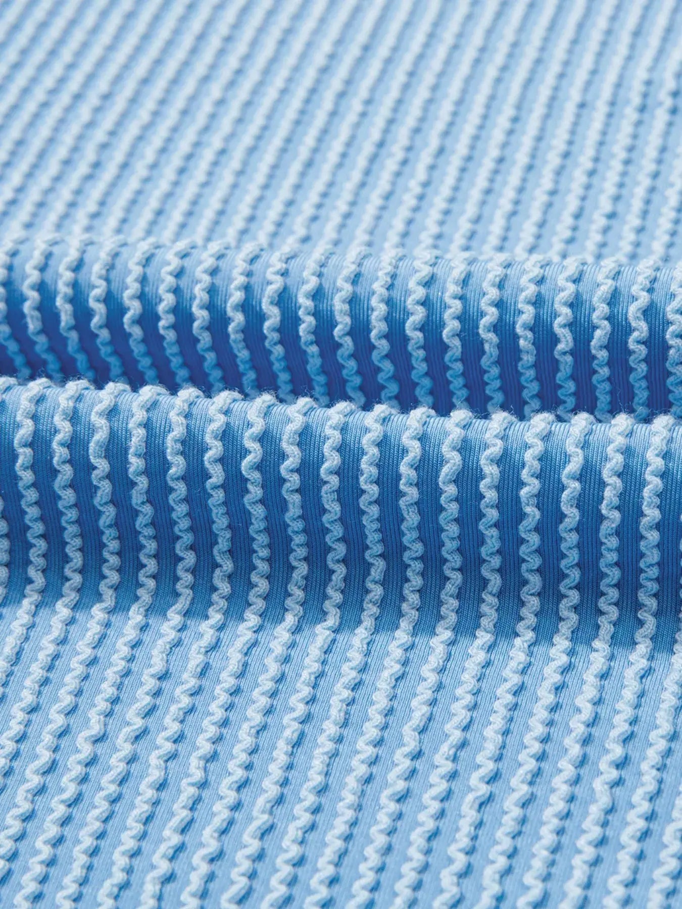 Twisted Rib Uneven Hem Drop Shoulder Loose Knit Top Simply Love