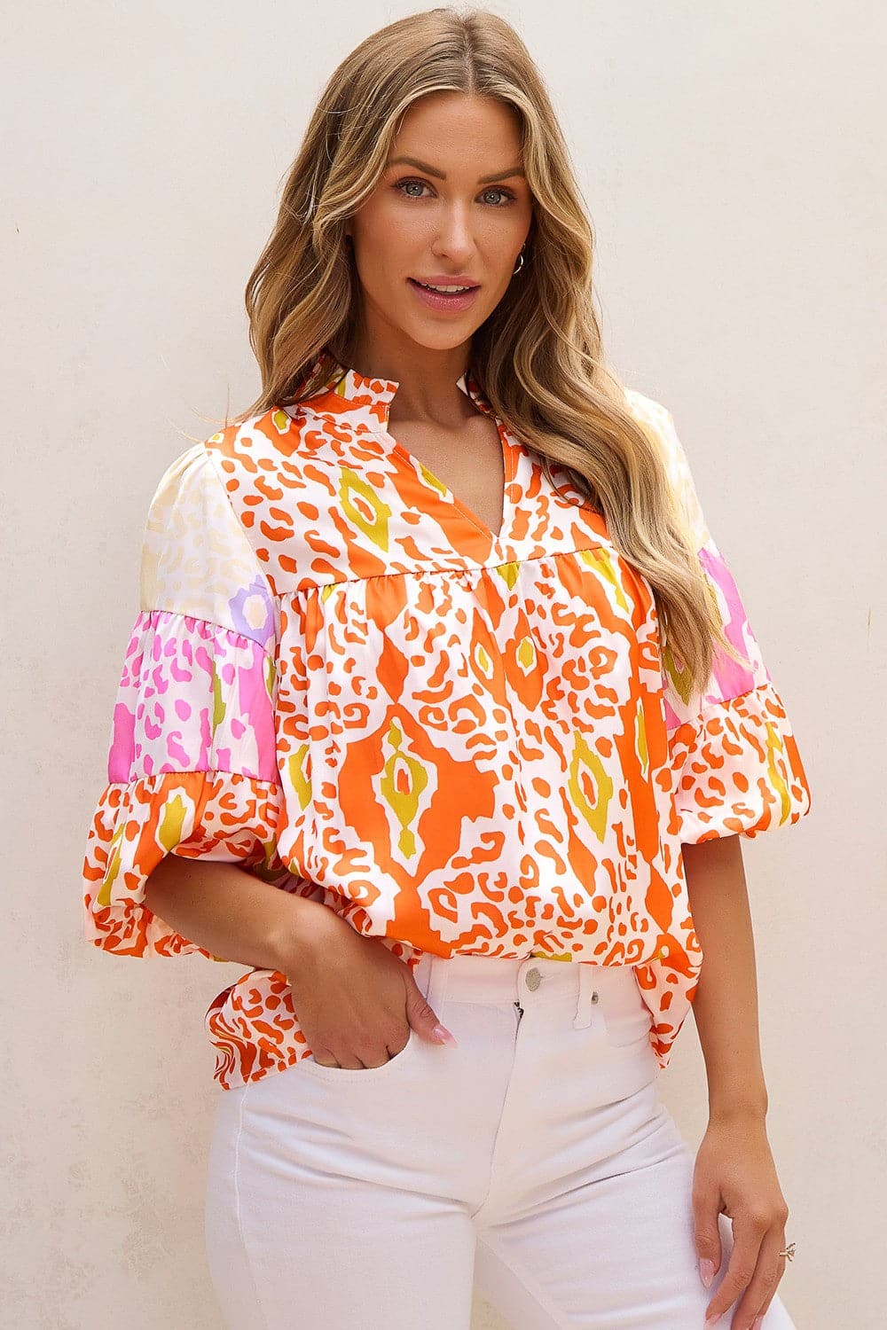 Printed Notched Half Sleeve Blouse.