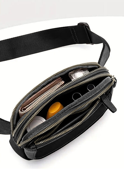 Sleek black crossbody bag with multiple zip compartments