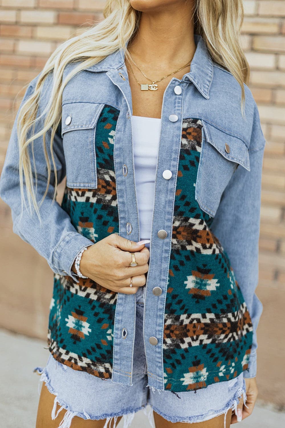 Pocketed Button Up Long Sleeve Denim Jacket.