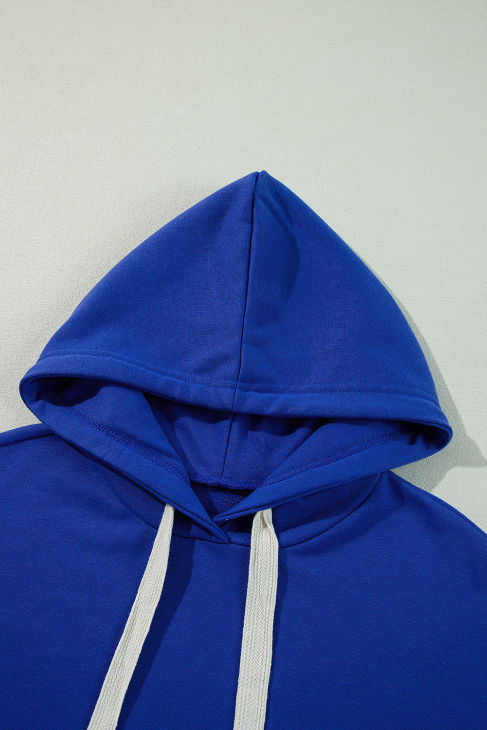 Chic dark blue cropped hoodie with drawstring hood and drop shoulder design