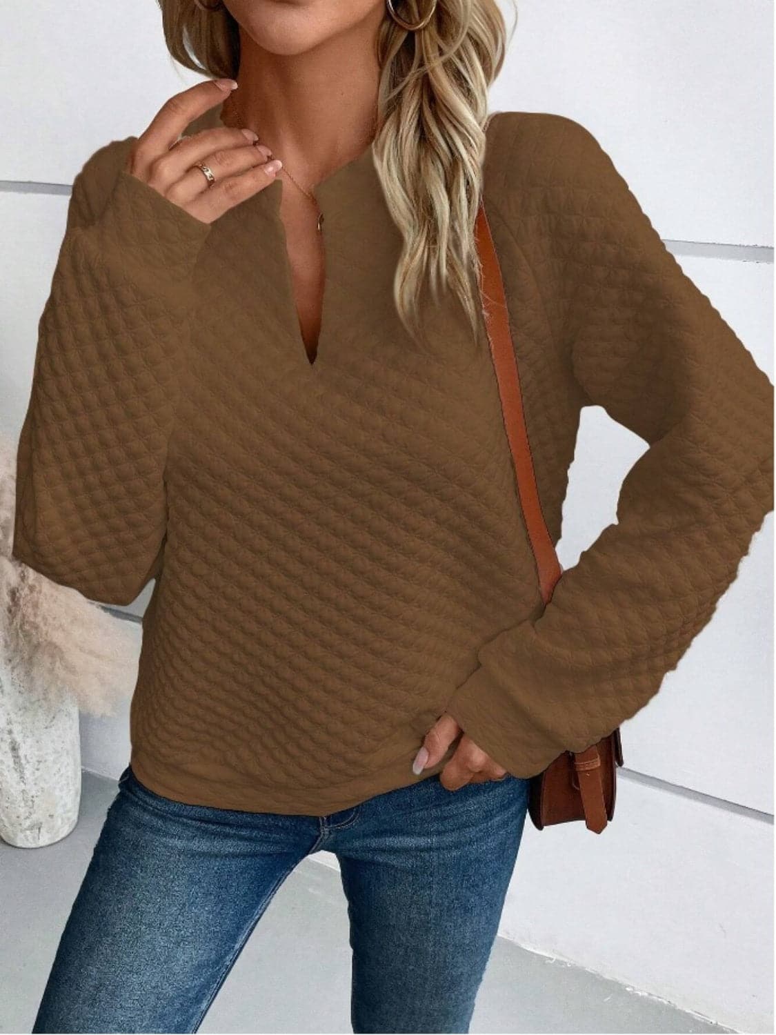 Notched Long Sleeve Sweatshirt.