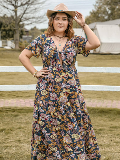 Plus Size Tied Printed Short Sleeve Midi DressPlus Size Tied Printed Short Sleeve Midi Dress
 Introducing our Plus Size Tied Printed Short Sleeve Midi Dress, the perfect blend of style and comfort for the modernLove Salve Size Tied Printed Short Sleeve Midi Dressjust arrived