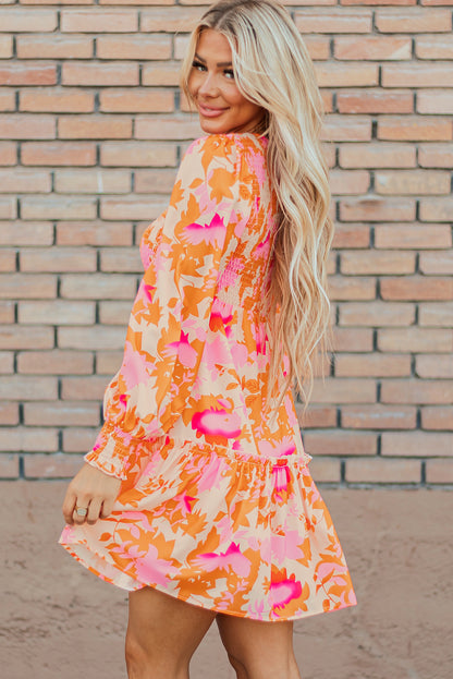 Orange smocked mini dress