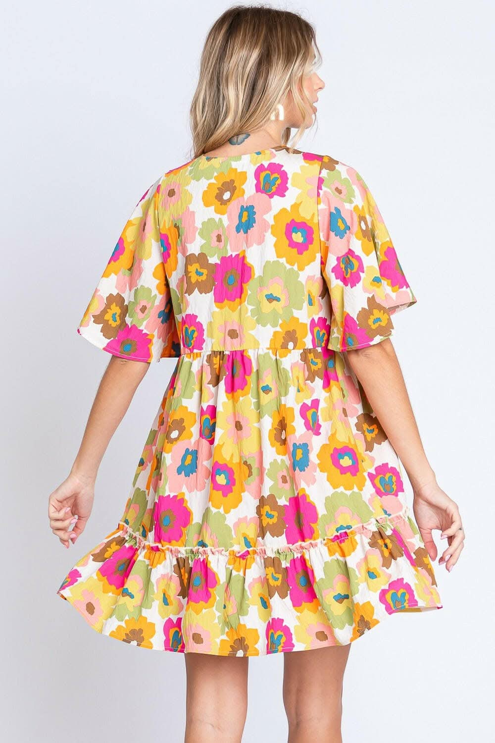 GeeGee Full Size Floral V-Neck Ruffle Trim Mini DressDiscover the GeeGee Full Size Floral V-Neck Ruffle Trim Mini Dress
 Step into a world of charm and elegance with the GeeGee Full Size Floral V-Neck Ruffle Trim Mini Love Salve -Neck Ruffle Trim Mini Dressusa