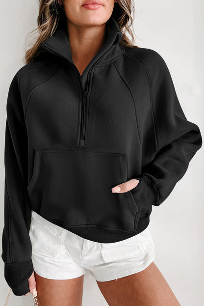 Chic black quarter zip sweatshirt with kangaroo pocket