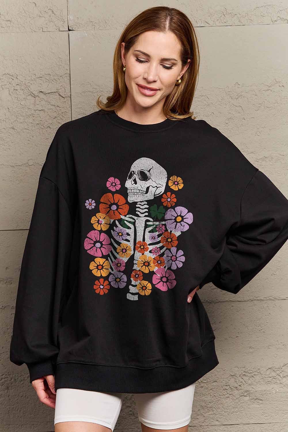 Floral skeleton graphic sweatshirt by Simply Love