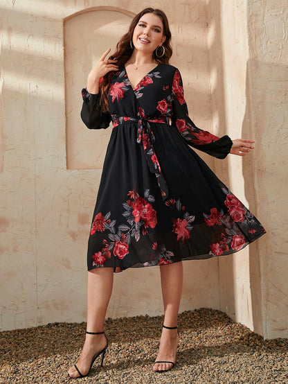 Plus Size Floral Surplice Neck Tie Waist DressUpgrade Your Wardrobe with Our Plus Size Floral Dress!
 
 
Style: Classy and Chic
 
Pattern Type: Floral
 
Neckline: Surplice
 
Length: Midi
 
Sleeve Length: Long BaLove Salve Size Floral Surplice Neck Tie Waist Dressplus