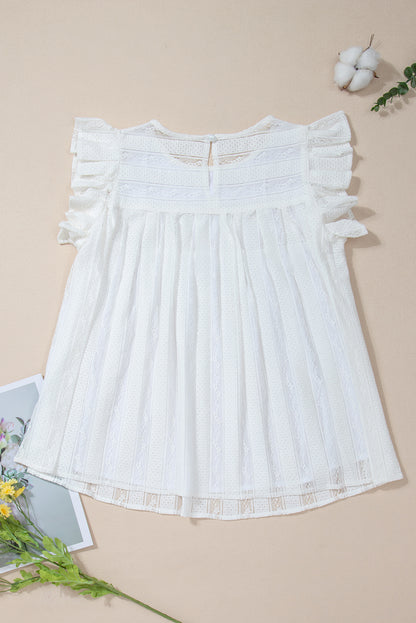 Lace-trimmed white flowy tank top with ruffled accents